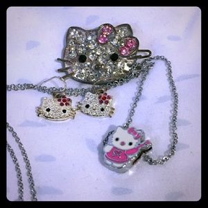 Hello Kitty earrings, necklace and hair clip.
